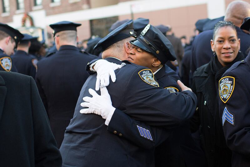 galleries/2014/12/27/the-nypd-says-farewell-to-officer-ramos/141227-police-funeral-10_mdv9ig
