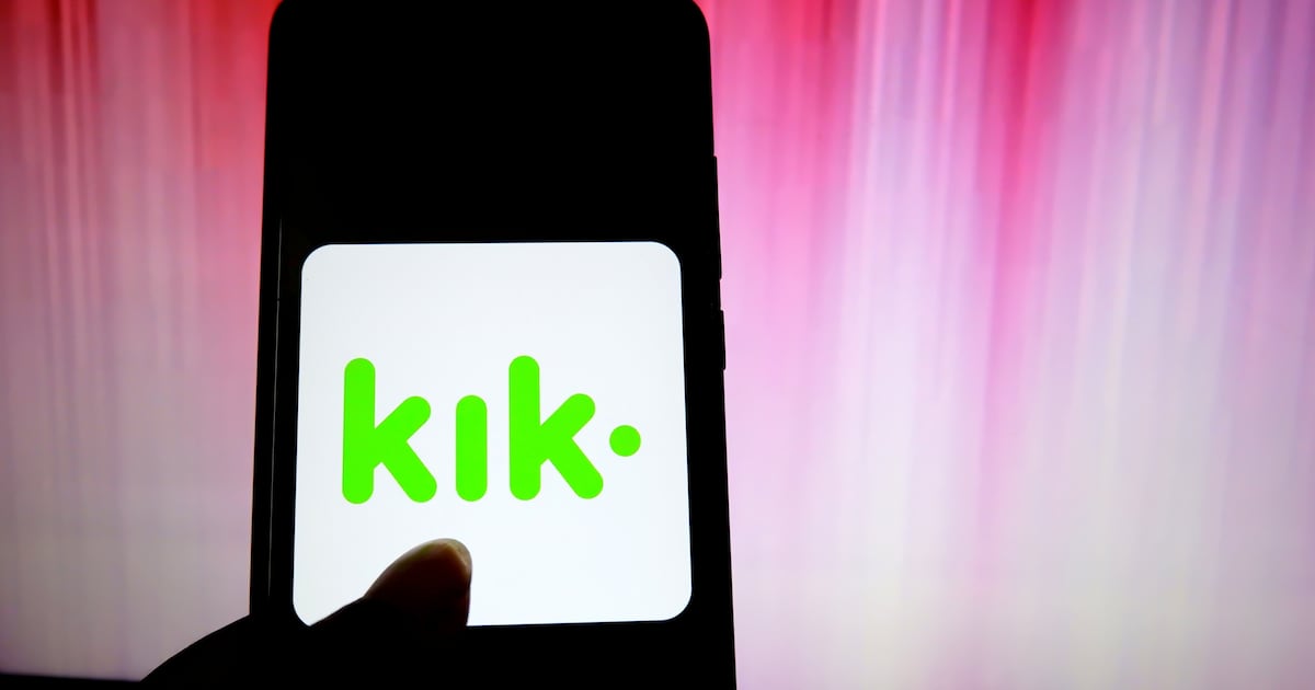 Photo: The Daily Beast In this photo illustration a popular messenger application Kik logo seen displayed on a smartphone