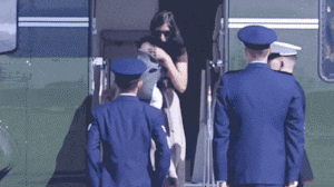 Usha Vance trips down the stairs on Marine One while carrying her infant child on Oct. 5, 2026.