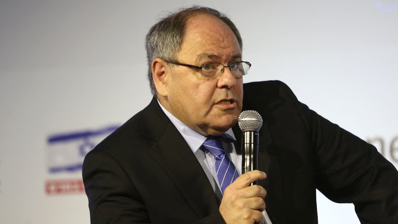 Former settler leader Dani Dayan talks during the Ynet and Yedioth Ahronoth's anti-BDS conference in Jerusalem on March 28, 2016. Israeli Prime Minister Benjamin Netanyahu backed down from his attempts to appoint the former settler leader as ambassador to Brazil, which has since August refused to accept the nomination.
Netanyahu "decided to appoint Dani Dayan as consul general in New York. He will replace foreign ministry career official Ido Aharoni, who is completing his term," the prime minister's office said in a statement. (Photo by MENAHEM KAHANA / AFP) (Photo by MENAHEM KAHANA/AFP via Getty Images)