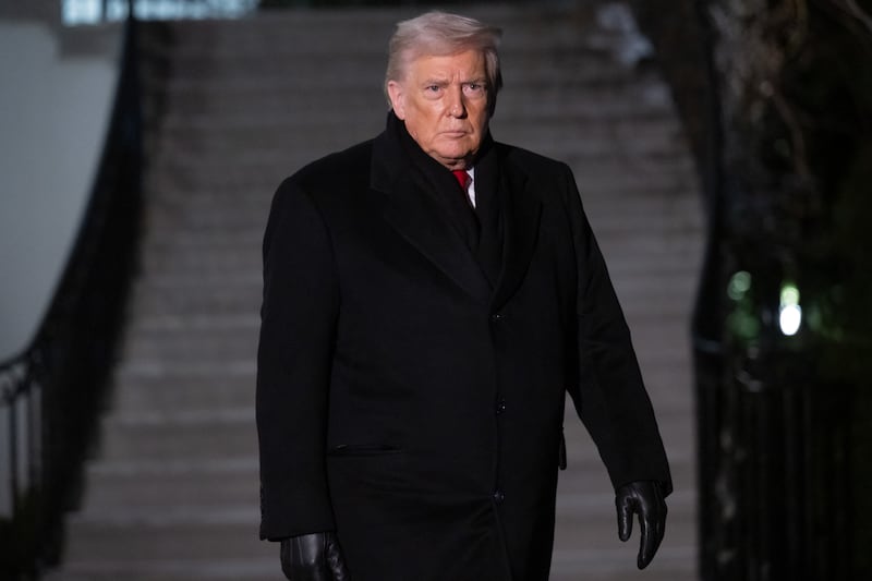 President Donald Trump walks to board Marine One at the White House in Washington, DC, on January 20, 2026. Trump is heading to the Swiss ski resort of Davos to attend the World Economic Forum (WEF).