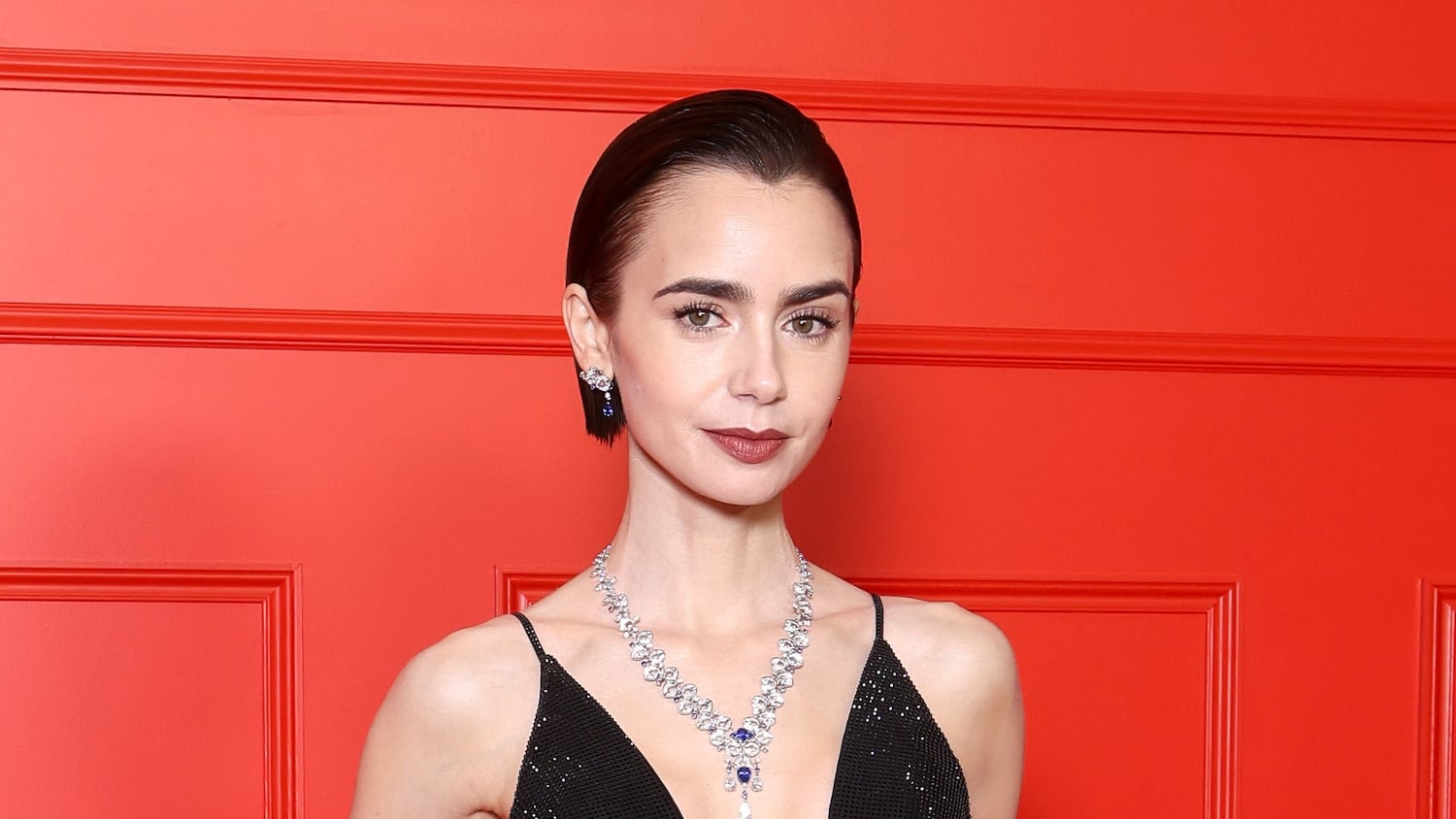 Lily Collins attends the Season 5 premiere of 'Emily In Paris' at Le Grand Rex in Paris on December 15, 2025.