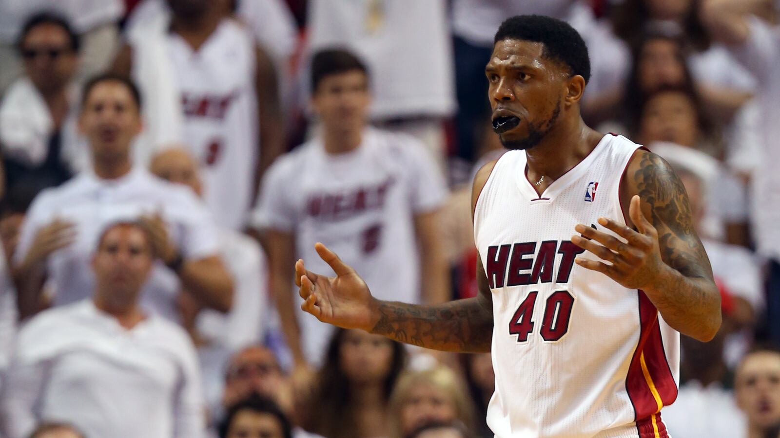 Udonis Haslem #40 of the Miami Heat reacts after a play against the Indiana Pacers during Game Three of the Eastern Conference Finals of the 2014 NBA Playoffs at American Airlines Arena on May 24, 2014 in Miami, Florida.