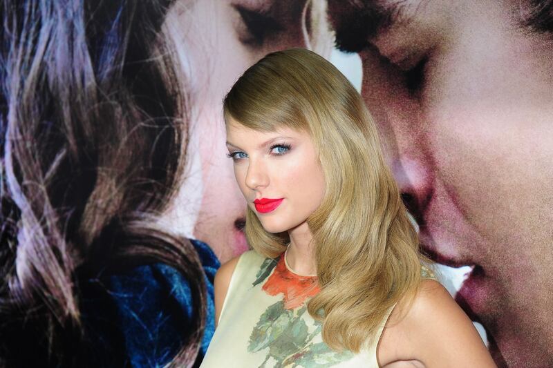 articles/2013/09/27/taylor-swift-cast-in-the-giver-kimmel-laughs-at-kanye-rap-feud/taylor_swift_tease_tr4zxi