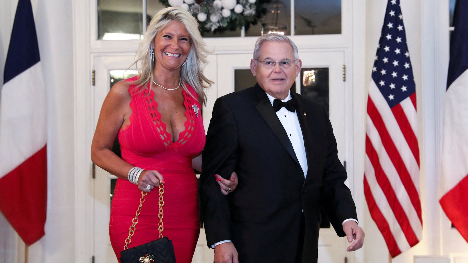 Senator Bob Menendez (D-NJ) and his wife Nadine Arslanian arrive for a state dinner in honor of French President Emmanuel Macron