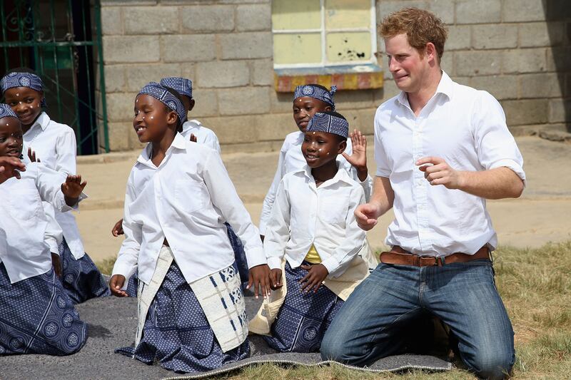 articles/2013/02/27/photos-prince-harry-kids-around-in-lesotho/harry-lesotho2_apvs5j