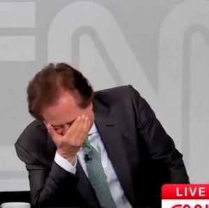 CNN correspondent Jamie Gangel and ;awyer George Conway laugh on CNN set.