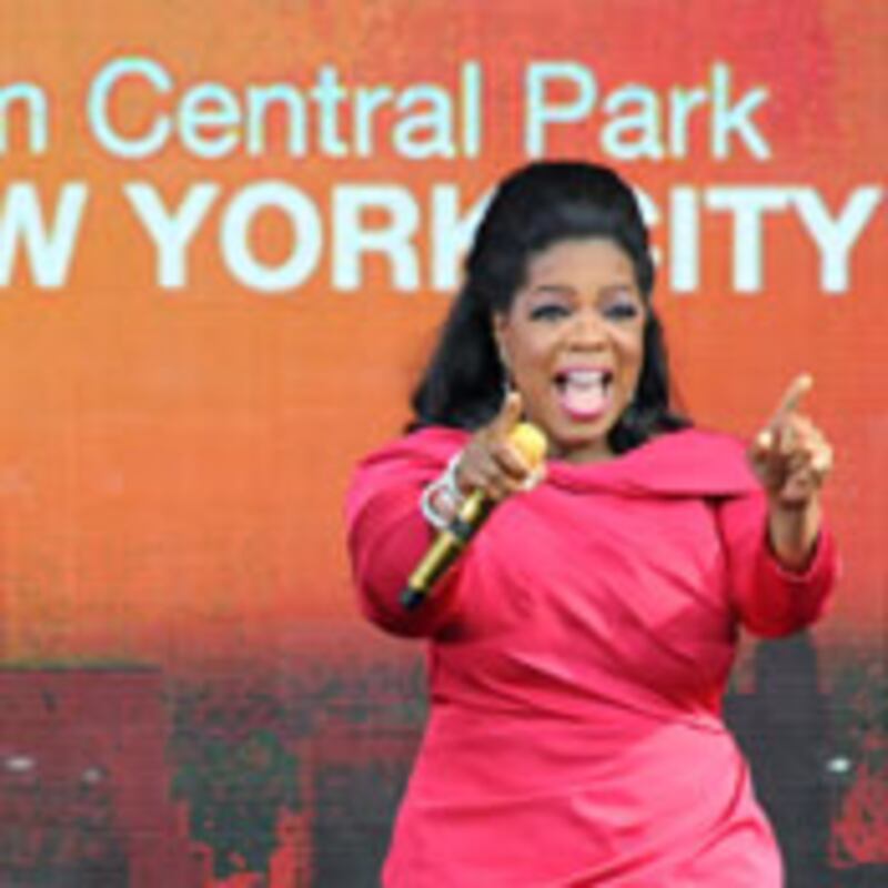 articles/2009/11/20/the-hole-in-our-lives/ali-oprah_64282_mo71th