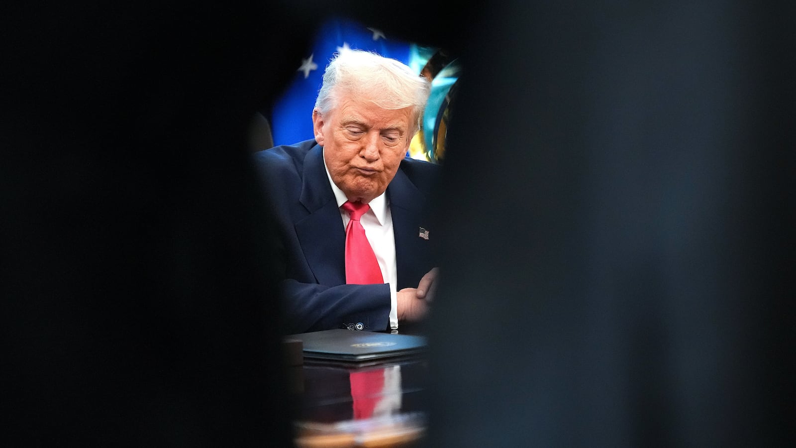 U.S. President Donald Trump answers questions from reporters