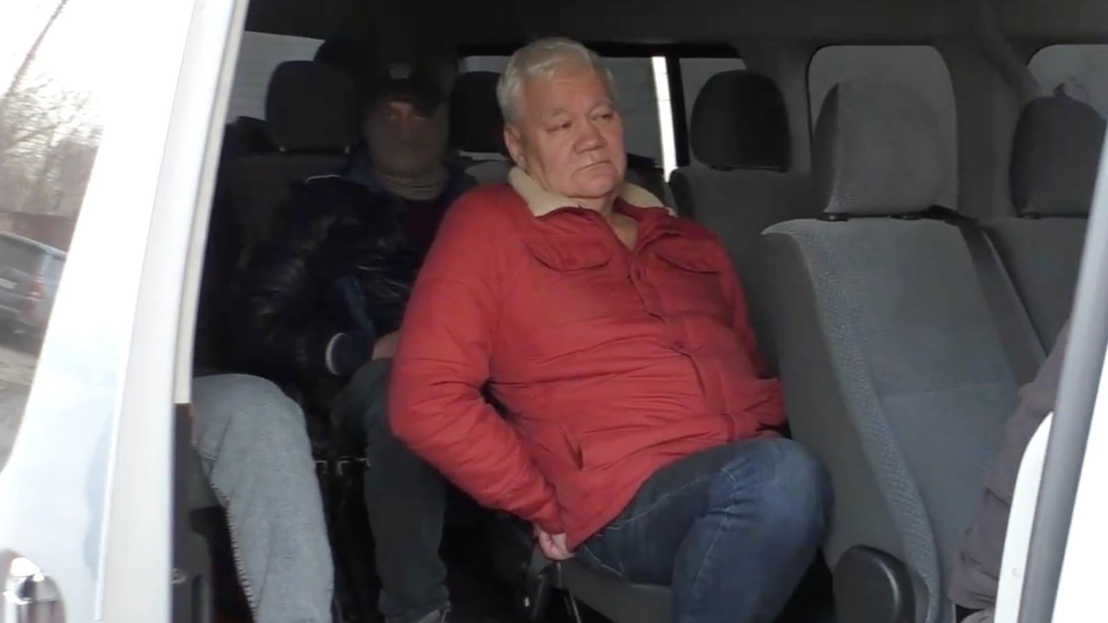 Still image from an FSB video showing the arrest of Robert Shonov, a former employee of the U.S. consulate in Vladivostok.