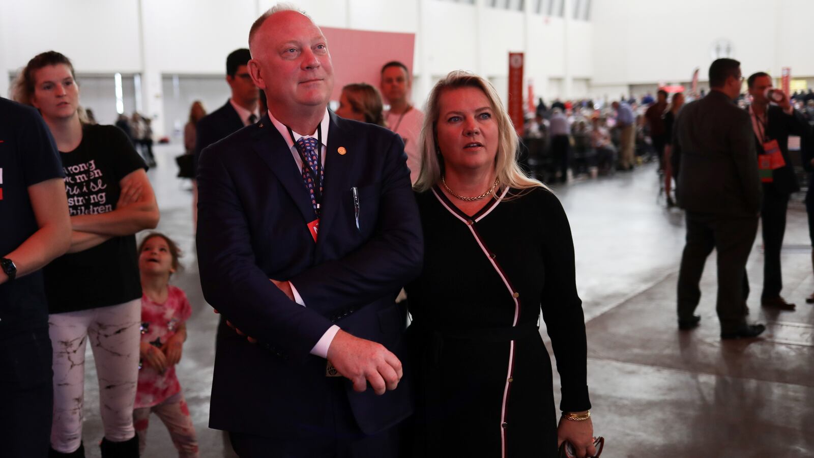 Meshawn Maddock (right) stands her husband, Michigan state representative Matt Maddock.