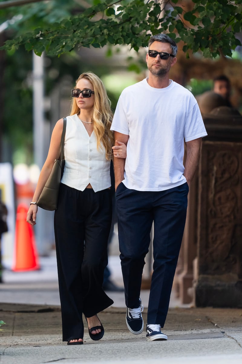 Jennifer Lawrence (L) and Cooke Maroney