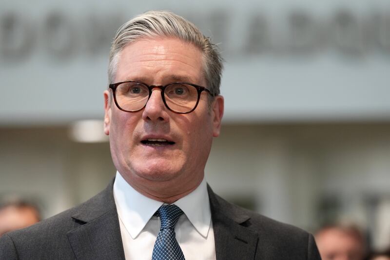 Britain's Prime Minister Keir Starmer speaks as he visits Northwood Headquarters to meet planners mapping out the next steps in the Coalition of the Willing on March 20, 2025 in Northwood, north-west London, England.