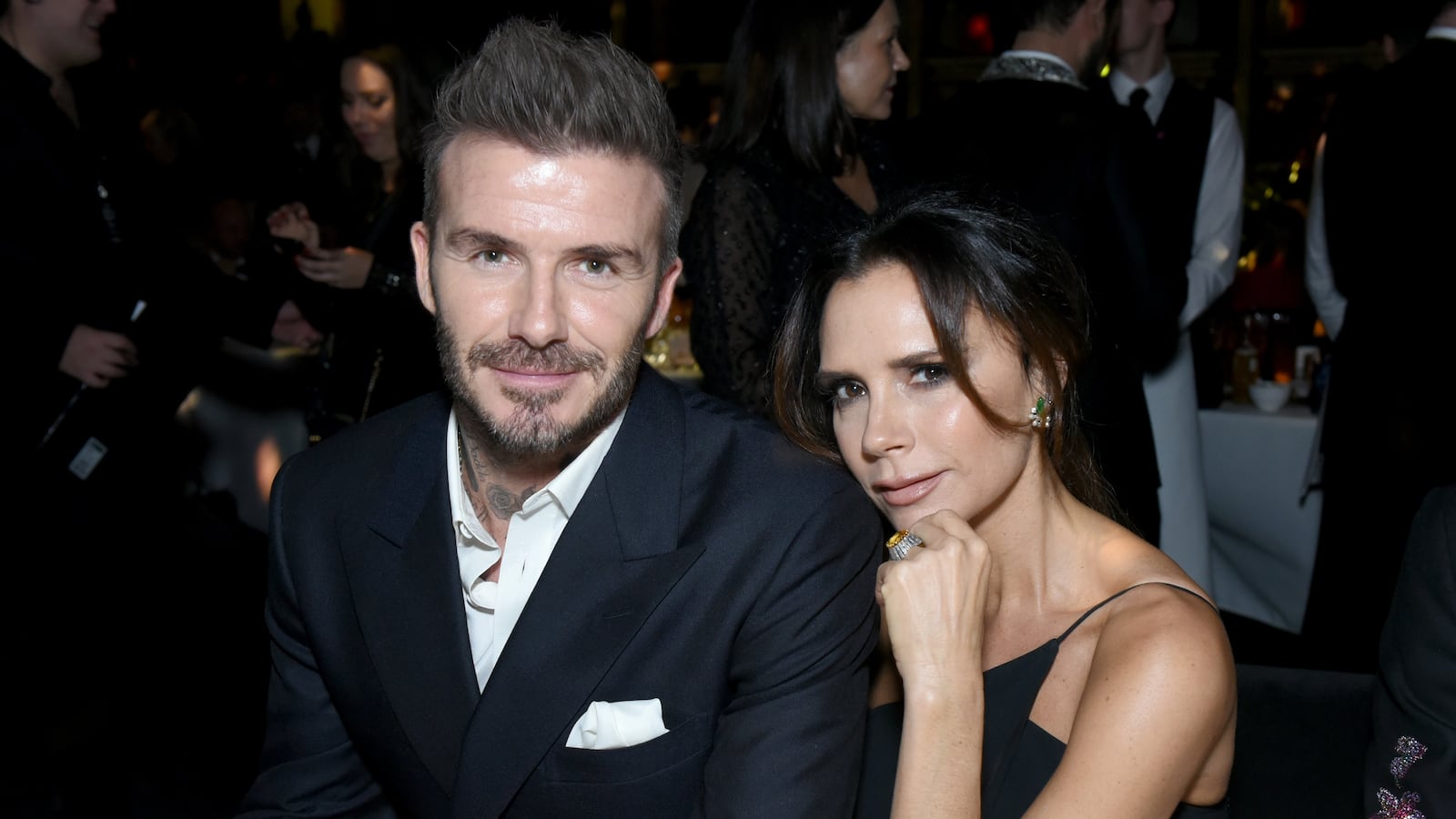 David Beckham (L) and Victoria Beckham (R)