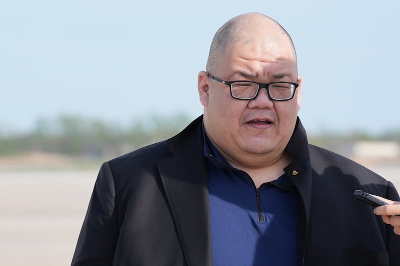 White House communications director Steven Cheung talks to reporters after arriving with Vice President JD Vance from Islamad, Pakistan, on Air Force Two, at Joint Base Andrews, Maryland, on April 12, 2026.