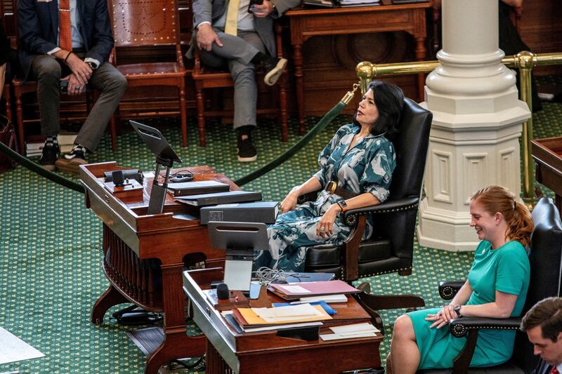 Binders sit on a desk in front of Texas state Sen. Carol Alvarado in the early hours of Saturday morning. Her staff filled them with material for her to read in what was planned to be an hours-long filibuster.