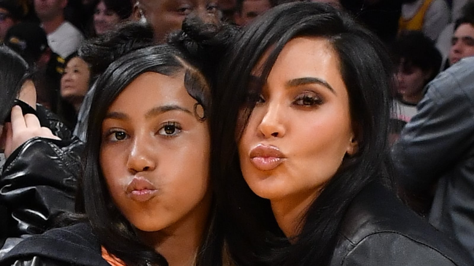 LOS ANGELES, CALIFORNIA - APRIL 09: Kim Kardashian (R) and North West attend a basketball game between the Los Angeles Lakers and the Golden State Warriors at Crypto.com Arena on April 09, 2024 in Los Angeles, California. NOTE TO USER: User expressly acknowledges and agrees that, by downloading and or using this photograph, User is consenting to the terms and conditions of the Getty Images License Agreement.