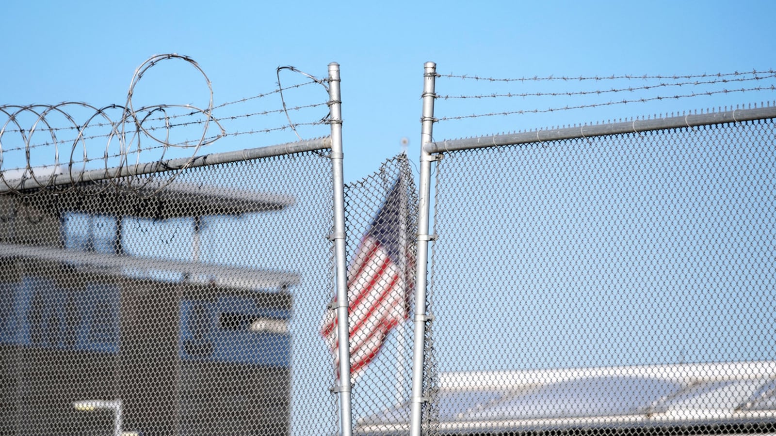 A US flag waves at the San Ysidro crossing port in the US-Mexico border seen from Tijuana, Baja California state, Mexico.