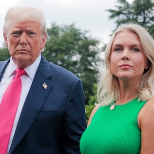 President Donald Trump, joined by White House Press Secretary Karoline Leavitt, speaks to the media as he departs the White House on July 15, 2025 in Washington, DC.