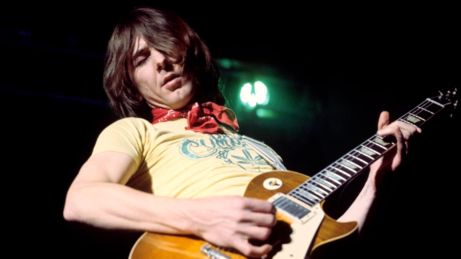 Mick Ralphs playing guitar.