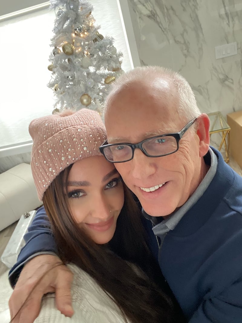 Scott Adams and his then-wife Kristina Basham on Christmas Day in 2020.