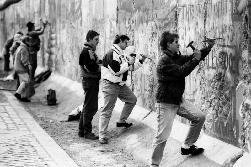 galleries/2014/11/07/a-wall-falls-and-a-cold-war-ends-photos/141107-berlin-wall4_j5ppa0