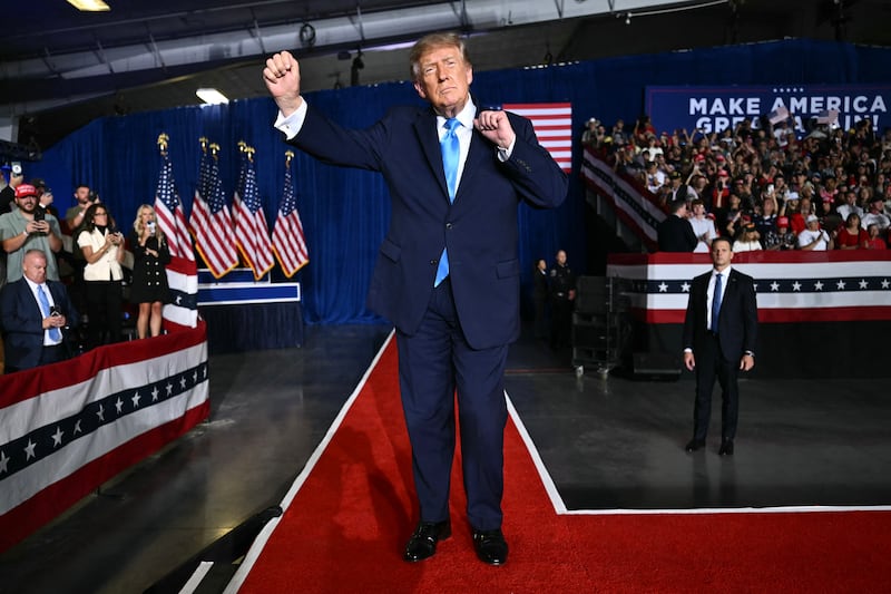 U.S. President Donald Trump dances after speaking during a campaign rally at Pinnacle Bank Expo Center in Grand Island, Nebraska, on October 5, 2026.