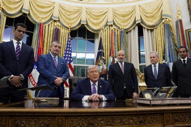 President Donald Trump looks on as he signs an executive order on AI in the Oval Office at the White House in Washington, D.C., on December 11, 2025.