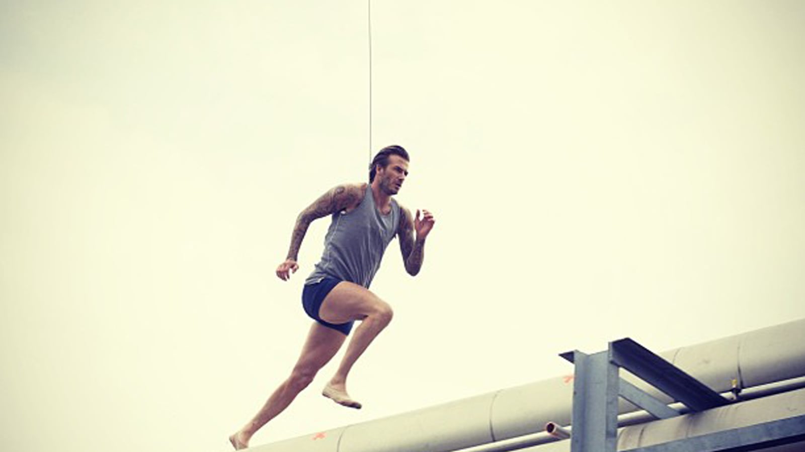 articles/2013/10/02/no-butt-double-this-time-as-beckham-strips-for-new-h-m-ad/131002-skyes-david-beckham-tease_nzfbjt