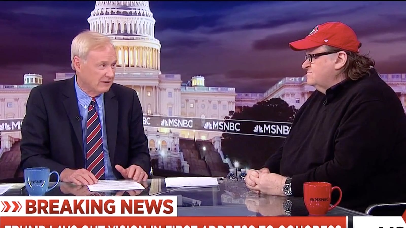 articles/2017/03/01/bill-maher-michael-moore-blast-trump-for-using-navy-seal-widow-as-a-prop/170228-wilstein-maher-moore-trump-tease_kik3io