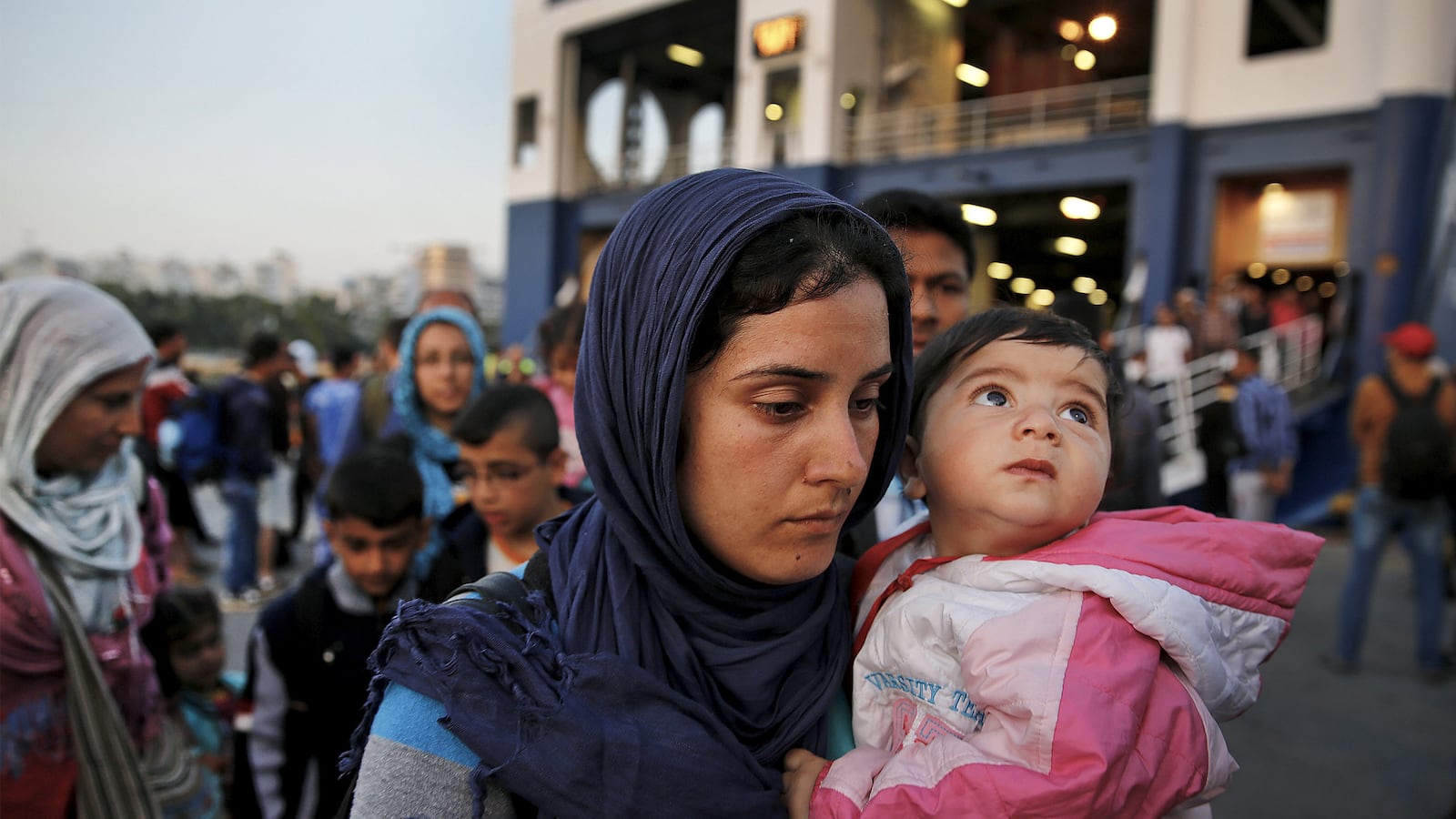 articles/2015/07/20/on-the-black-road-into-europe-with-syria-s-refugees/150719-psarapoulos-greece-syrians-tease_shlijz