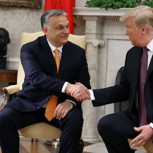 U.S. President Donald Trump shakes hands with Hungarian Prime Minister Viktor Orban during a meeting in the Oval Office on May 13, 2019 in Washington, DC.