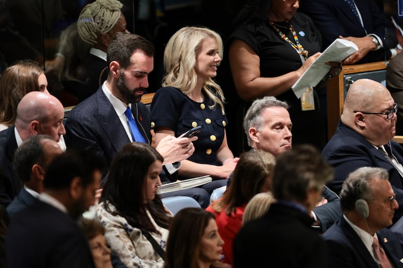 Harp smiles as Trump speaks at the U.N.
