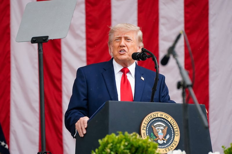 U.S. President Donald Trump delivers remarks in the Memorial Amphitheater during a Memorial Day event at Arlington National Cemetery, Arlington, Virginia, U.S., May 25, 2026. REUTERS/Nathan Howard