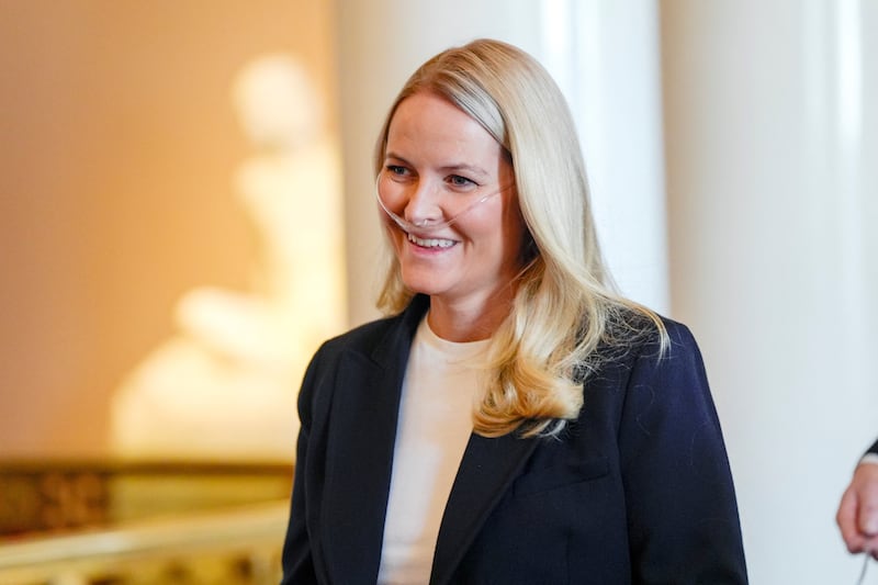 Norway’s Crown Princess Mette Marit wears breathing assistance as the Crown Prince’s family holds a reception for the Norwegian athletes in April 2026.