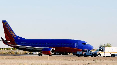 cheats/2011/04/02/hole-in-plane-ceiling-forces-emergency-landing/irving-southwest-airlines_170832_gnqlxw