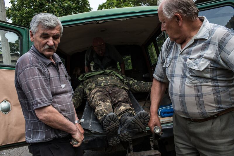 articles/2014/05/22/desperate-violence-before-ukraine-vote/140522-ukraine-dettmer-tease_x82q7y