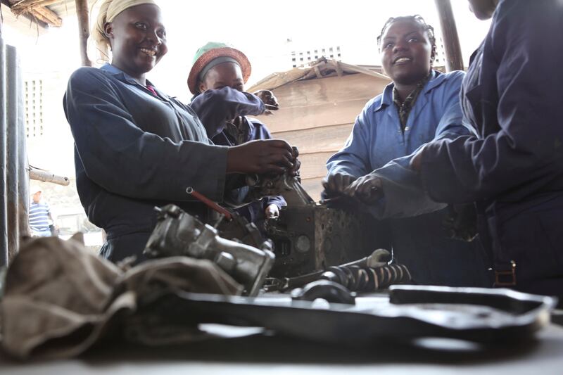 articles/2014/06/06/victims-no-more-congo-s-badass-women-mechanics/140605-congo-mechanics4_kxl71p