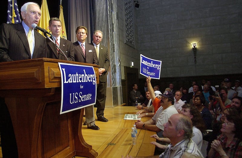 Former U.S. Senator Frank Lautenberg (L) addresses supporters at a New Jersey Democratic Party rally in 2002.