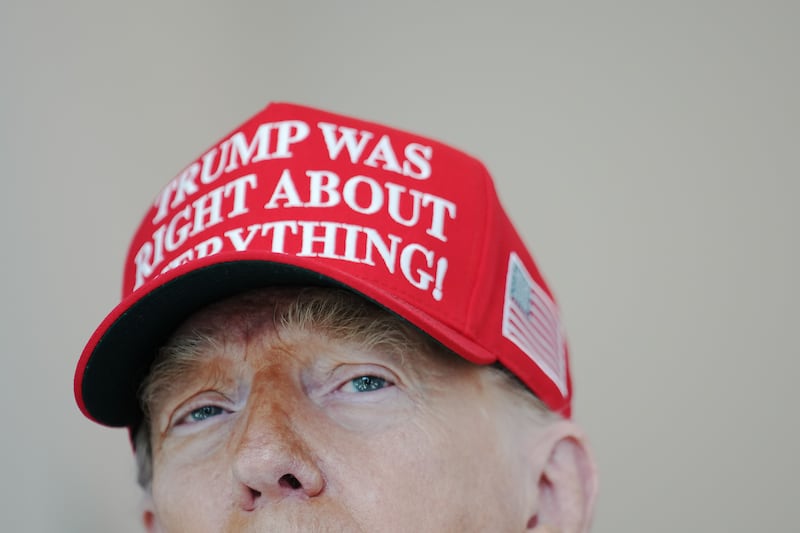 President Donald Trump speaks to the media wearing a hat that reads, "Trump Was Right About Everything!" on August 22, 2025 in Washington, D.C.