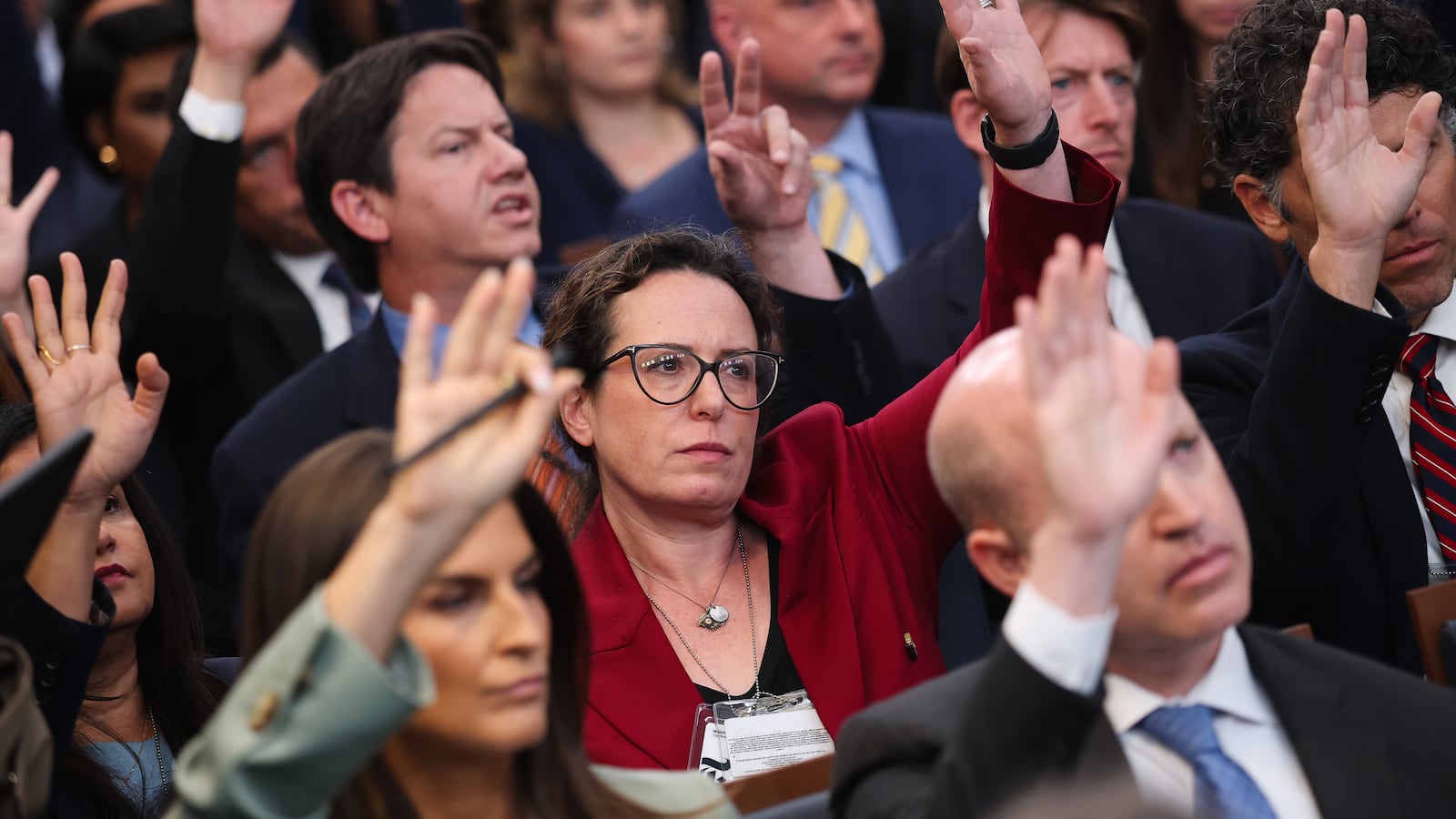 WASHINGTON, DC - SEPTEMBER 09: White House correspondent for The New York Times Maggie Haberman (C) and fellow reporters raise their hands as they wait to be called on during a daily press briefing in the Brady Press Briefing Room at the White House on September 9, 2025 in Washington, DC. Leavitt discussed a range of topics during the briefing including recent immigration enforcement actions by the Trump administration and the release of new documents related to the Jeffrey Epstein investigation by a Congressional committee yesterday. (Photo by Win McNamee/Getty Images)
