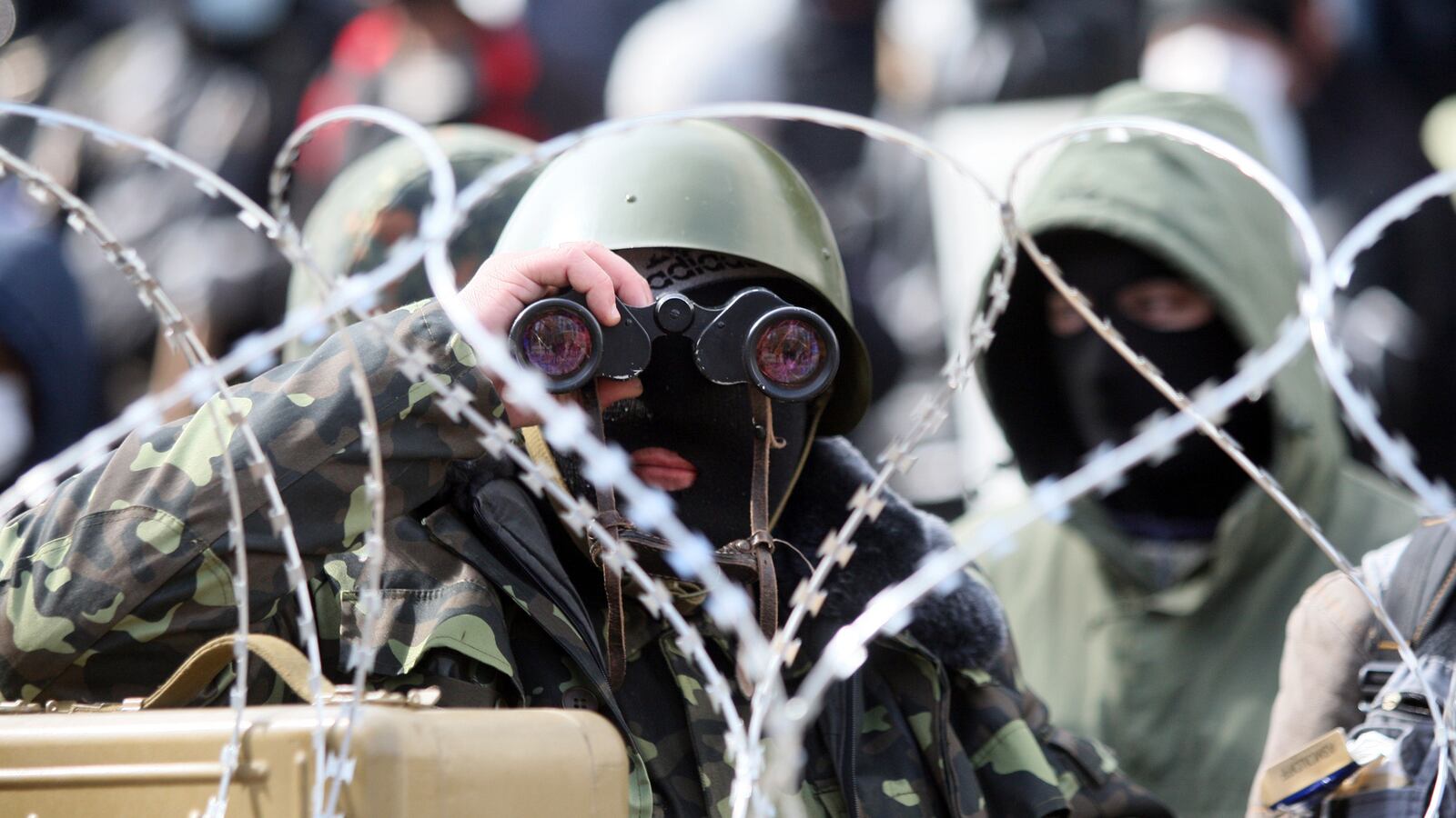 articles/2014/04/09/pro-russian-protestors-in-east-ukraine-laugh-at-kiev-s-threats/140409-patrikarakos-donetsk_akrfsl