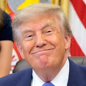 President Donald Trump attends an event to sign an executive order regarding vaccine flexibility, with Heidi Overton (not pictured), Dr. Jay Bhattacharya, Director of the National Institutes of Health, and Secretary of Health and Human Services (HHS) Robert F. Kennedy Jr., in the Oval Office at the White House in Washington, D.C., U.S., August 10, 2026. REUTERS/Kylie Cooper