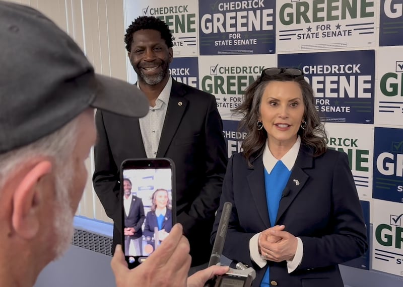 Democratic candidate Chedrick Greene campaigning with Michigan Gov. Gretchen Whitmer.