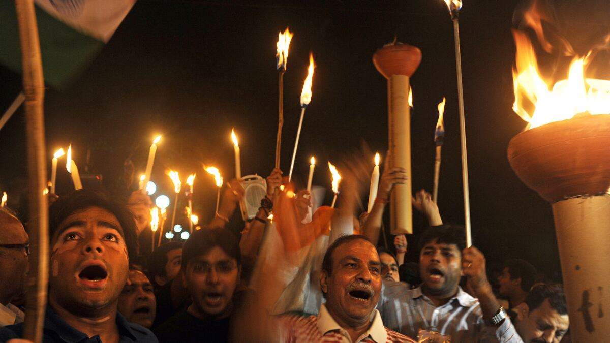 articles/2012/06/11/what-happened-to-india/india-protests-tripathi_q3tweb