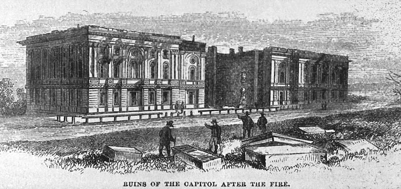 An illustration showing the ruined exterior of the U.S. Capitol building after the British burnt it during the War of 1812.