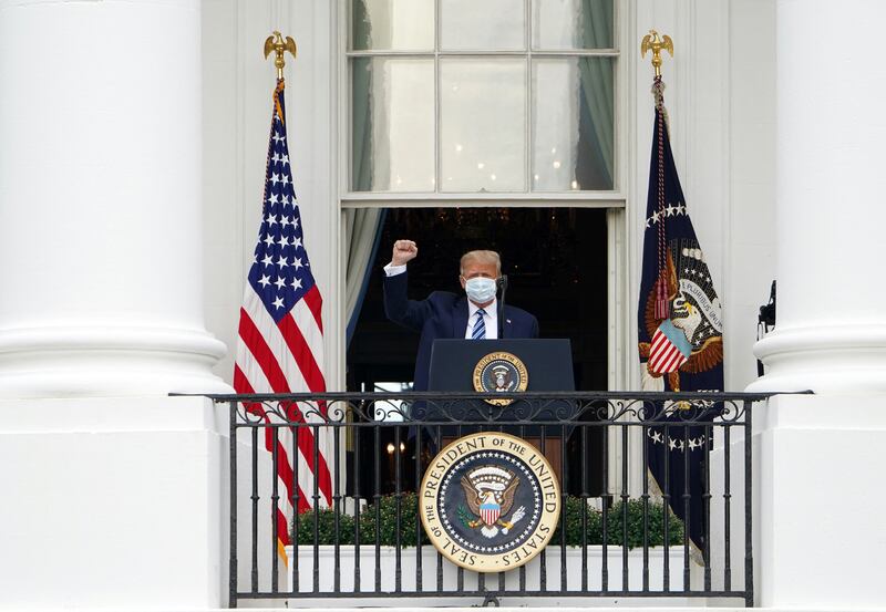 TOPSHOT - US President Donald Trump arrives to speak about law and order from the South Portico of the White House in Washington, DC, on October 10, 2020. Trump spoke publicly for the first time since testing positive for Covid-19, as he prepares a rapid return to the campaign trail just three weeks before the election. (Photo by MANDEL NGAN / AFP) (Photo by MANDEL NGAN/AFP via Getty Images)