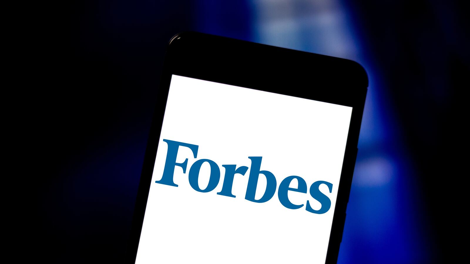 Forbes logo on a phone.