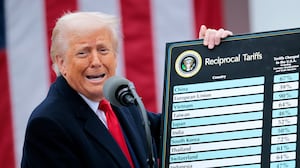 President Donald Trump holding up his tariff chart on what he called “Liberation Day” on April 2 as he has moved to impose sweeping tariffs on countries around the world since taking office.