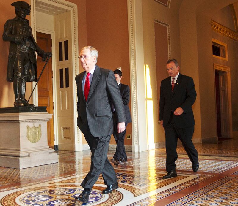 articles/2011/07/31/mitch-mcconnell-debt-deal-with-gop-is-very-close/mcconnell-walking-debt-vote-box_xmecxu